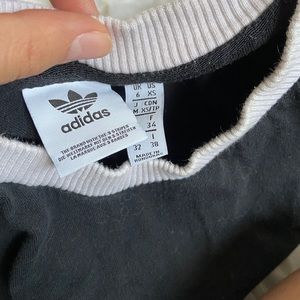 Black adidas trifold